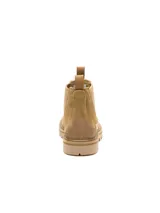 Bota Chelsea Caterpillar modelo Grader, color marrón en gamuza, con elásticos laterales, tiradores en la parte superior y suela de goma tractorada.