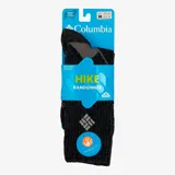 Medias de trekking Columbia de lana merino, color gris oscuro con detalles en gris claro. Diseño de peso medio con tecnología de absorción de humedad y control de olores.