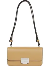 Cartera bandolera Tommy Jeans color beige con acabado granulado y logo metálico plateado en el frente.