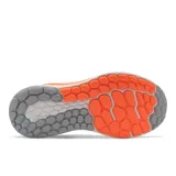 Championes de running New Balance WVNGOBM5 para mujer, color naranja con detalles en blanco y gris.