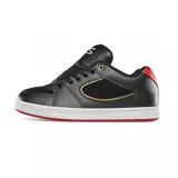 Zapatillas de skate negras con detalles en rojo y dorado, de cuero y gamuza, con suela blanca y cordones negros.