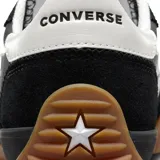 Championes Converse Run Star Trainer, unisex, color negro con detalles en blanco y suela de goma color caramelo.