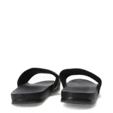 Sandalia tipo ojota Umbro modelo Pro Foam, color negro con el logo de la marca estampado en celeste y blanco en la tira superior.