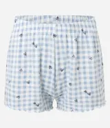 Conjunto de pijama short doll de punto, estampado de cuadros vichy celestes y blancos con mini corazones negros. Incluye un top de breteles finos con escote en V y un short con cintura elástica.