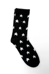 Pack de tres pares de medias crew con diferentes estampados: lunares blancos sobre fondo celeste, corazones negros sobre fondo beige y estrellas blancas sobre fondo negro.