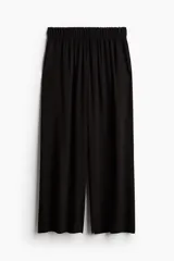 Pantalón tobillero de viscosa con caída suave, tiro alto con cintura elástica y piernas amplias de corte recto.