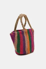 Mini bolso ovalado de yute 100%, con diseño de rayas multicolor y asas de mano redondas revestidas.