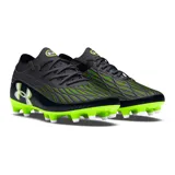 Championes de fútbol Under Armour Magnetico Pro 4 FG, color negro con detalles en verde neón. Presentan tecnología UA Clone en la parte superior para un ajuste personalizado, impresión 3D para mayor control y suela con tacos cónicos de TPU para agilidad en todas las direcciones.