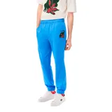 Pantalón de jogging azul con cintura elástica y cordón ajustable. Estampado lateral con logo de Lacoste y diseño de Netflix.