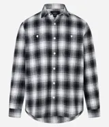 Camisa de franela a cuadros en blanco y negro, de corte comfort, con cuello inglés, abotonadura frontal, manga larga, bolsillo en el pecho y puños abotonados.