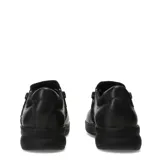 Zapatos casuales de mujer Lombardino Mery, color negro, confeccionados en cuero y nobuk, con diseño tipo slip-on, cierre lateral y suela plana de goma.