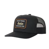 Gorra tipo trucker color negro, con frente de lona de algodón y parte trasera de malla de poliéster. Presenta un parche rectangular con bordes marrones y el logo de la marca Katin bordado en el centro. Cuenta con visera curva y cierre ajustable en la parte posterior.