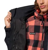 Campera impermeable Columbia Bugaboo II 1986 de color negro, con cuello alto, cierre frontal con solapa, bolsillos con cierre y puños ajustables con velcro. Cuenta con tecnología Omni-Tech y logo de la marca bordado en el pecho.