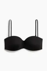Soutien strapless de microfibra color negro, con copas acolchadas y tirantes finos ajustables y desmontables.