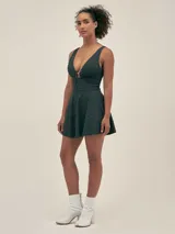 Minifalda negra de tela de traje de baño con protección UV50.