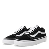 Championes Vans Old Skool negros con la franja lateral blanca, confeccionados en lona y gamuza, con suela de goma blanca.