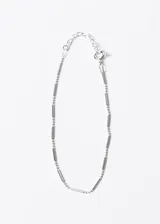 Pulsera plateada de plata 925 con esferas y barras alternadas.