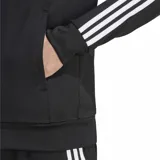 Campera deportiva Adidas Adicolor Classics negra con cierre frontal, cuello alto y tres rayas blancas en las mangas.