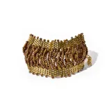 Brazalete de bijouterie con mostacillas color dorado y marrón.