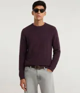 Suéter de punto para hombre, con textura acanalada horizontal, cuello redondo, mangas largas y puños ajustados.