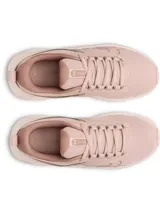 Championes de running Under Armour Surge 5 color rosado, con parte superior de malla transpirable, suela amortiguada y logo de la marca en el lateral.