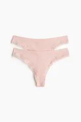 Pack de dos bombachas colaless rosadas de tiro medio, confeccionadas en tejido acanalado seamless con detalles de encaje en los bordes.
