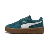 Championes Puma Palermo Elevated color verde con detalles en blanco y suela marrón.