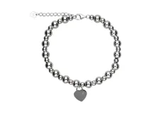 Pulsera de plata con esferas de 4mm y 6mm, dije de corazón de 1cm y cierre de mosquetón.