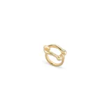 Anillo dorado con diseño abstracto de líneas curvas y esferas.