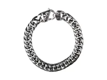 Pulsera de acero plateado con eslabones gruesos y cierre de mosquetón con diseño de flor de lis.