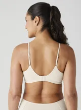 Top color natural de tejido de punto acanalado con breteles finos.