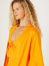 Kimono naranja de mangas 3/4.