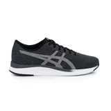 Championes Asics modelo Streetwise, color negro con detalles en gris y suela blanca. Diseño deportivo con tejido transpirable y logo lateral característico de la marca.