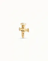 Aro piercing dorado con forma de cruz.