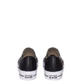 Championes Converse Chuck Taylor All Star Lift OX de cuero negro con plataforma blanca y cordones blancos.
