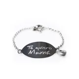 Pulsera de plata 925 con cadena de eslabones y chapa ovalada con la inscripción "Te Quiero Mamá" y dije de corazón colgante.
