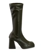 Bota de caña media color verde militar, con plataforma y taco cuadrado.