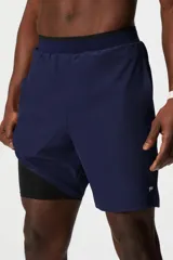 Short de entrenamiento Fabletics, color azul marino, con cintura elástica y diseño deportivo. Cuenta con forro interno, bolsillos laterales y bolsillo oculto.