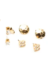 Set de seis pares de aros tipo abridores en tono dorado, con diseños surtidos que incluyen corazones, cristales solitarios, cisnes, formas orgánicas martilladas y tréboles con incrustaciones de pedrería.