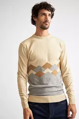 Sweater de cuello redondo y manga larga, con diseño de bloques de color y patrón geométrico en forma de rombos en la parte inferior. Confeccionado en tejido de punto de algodón.
