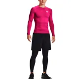 Calza larga de compresión Under Armour HeatGear Armour, color negro con cintura elástica gris con logo de la marca.