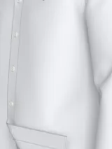 Camisa blanca de popelina de algodón con tecnología Flex que proporciona elasticidad en cuatro direcciones. Tiene cuello con botones, puños redondeados con botón y logo de Tommy Hilfiger bordado en el pecho.