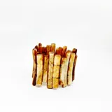 Pulsera elástica con piezas rectangulares de resina color blanco.