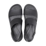 Sandalias tipo plataforma Crocs modelo Brooklyn Low Wedge, con tiras superiores en color azul marino y base de plataforma en color beige. Diseño ergonómico con tira ajustable en el talón.