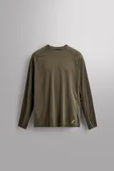 Camiseta de entrenamiento de manga larga con cuello redondo, confeccionada en tejido técnico ligero y elástico con textura de rayas horizontales. Presenta mangas ranglán y un pequeño logo estampado en el bajo.
