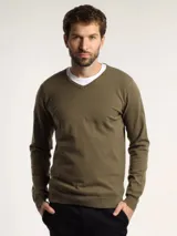 Sweater de punto con cuello en V, manga larga y puños acanalados, de corte clásico.