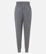 Pantalón de jogging deportivo azul con cintura ajustable con cordón, bolsillos laterales y tobillos ajustados.