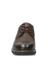 Zapato casual Hush Puppies modelo Bolo, color marrón oscuro, confeccionado en cuero con ajuste de cordones, costuras pespunteadas visibles y suela de EVA.