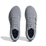 Championes Adidas Response color gris con detalles plateados y suela blanca.