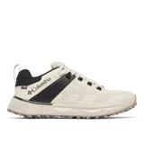 Championes de senderismo Columbia Facet 75 OutDry, color beige con detalles en negro. Presentan un diseño técnico con malla duradera, soporte de TPU en el mediopié, clip en el talón y suela con tracción avanzada para terrenos irregulares.